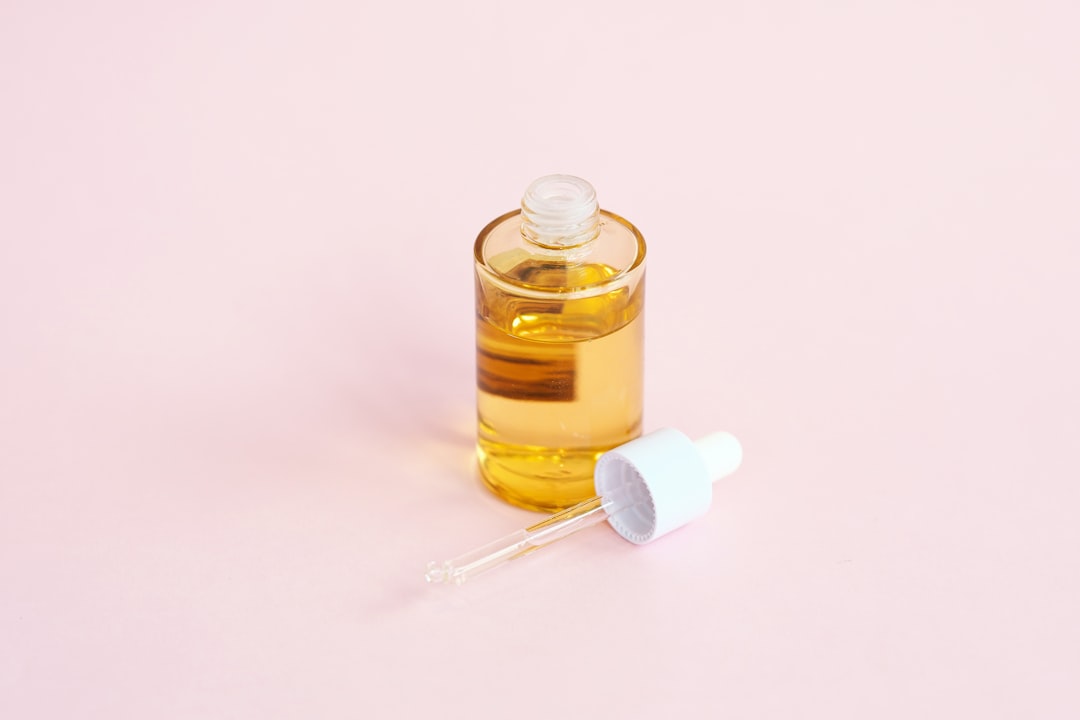 Brightening skincare serum bottle and dropper