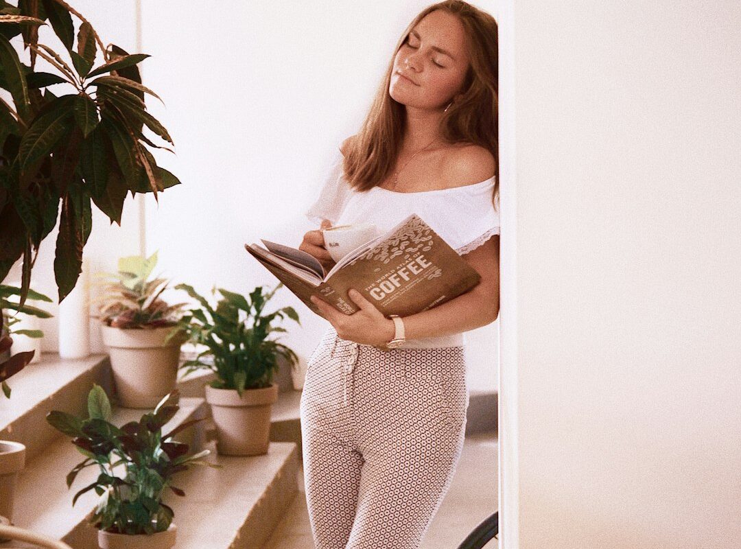 Woman enjoying a quiet morning moment as part of a wellness routine