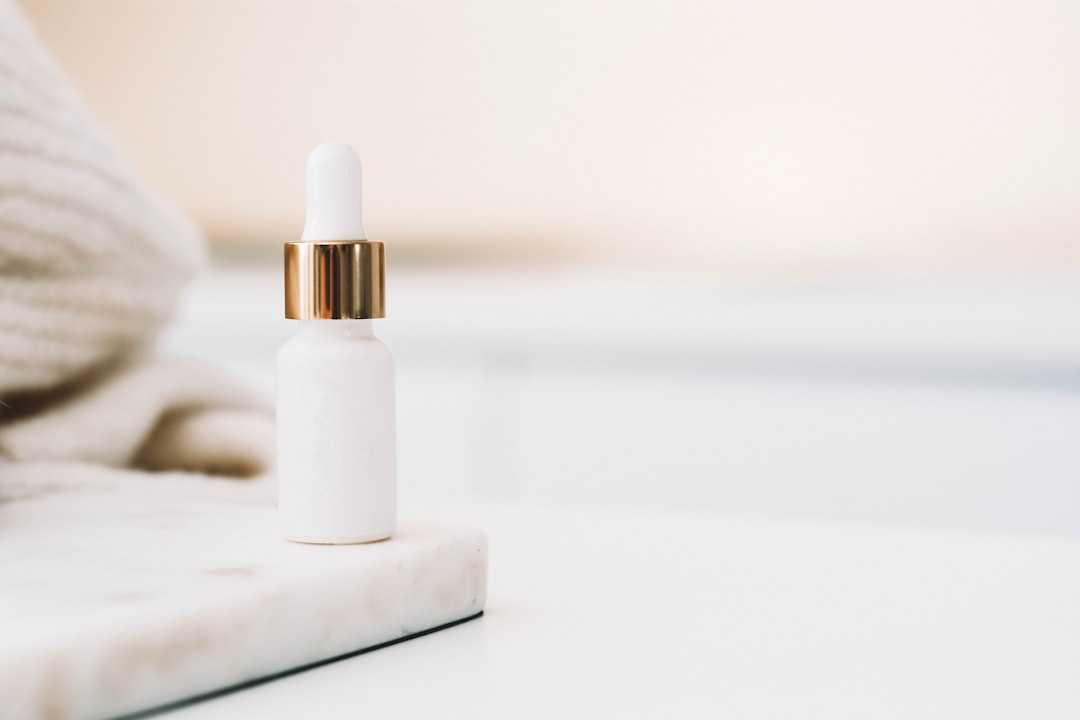 Skincare serum bottle and dropper for a pigmentation treatment