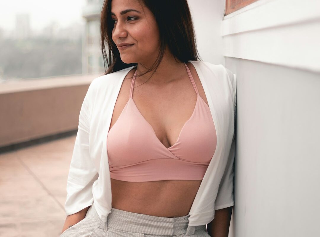 Woman wearing a wirefree bra, illustrating longline bra support and fit for a fuller bust
